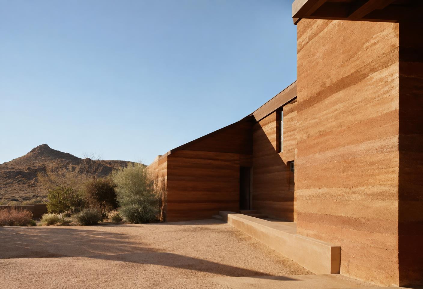 Rammed-earth residence in an arid landscape